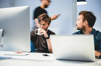 Nicepixels Developers Working in the Office
