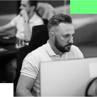 Photo of a man at a computer handling contact inquiries Nicepixels